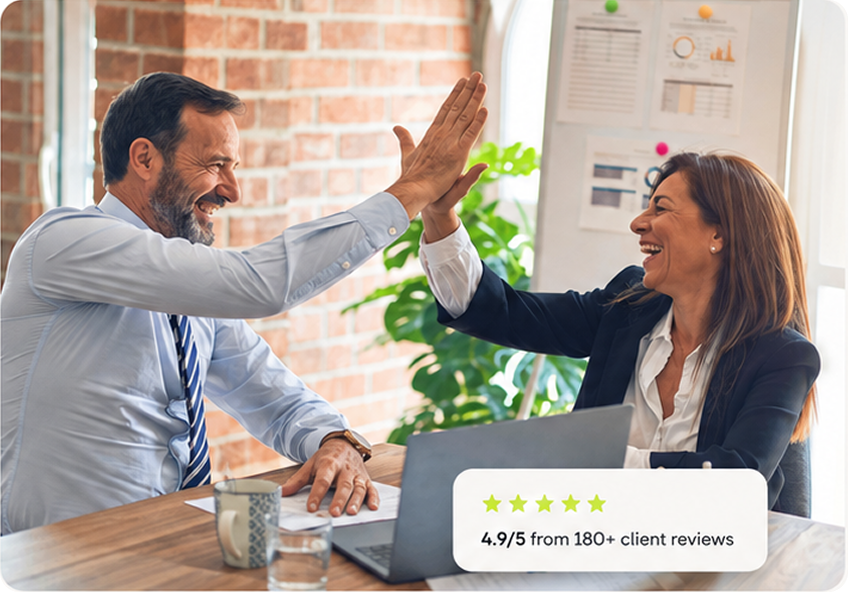 Professionals celebrating a successful transformation outcome